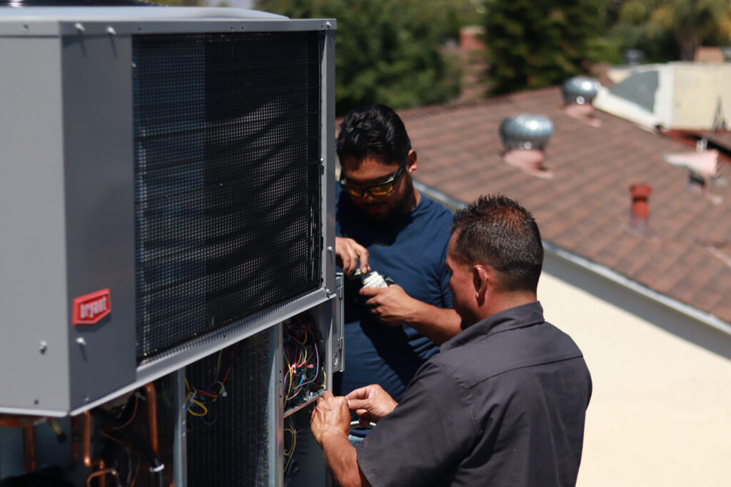 technicians doing ac maintenance