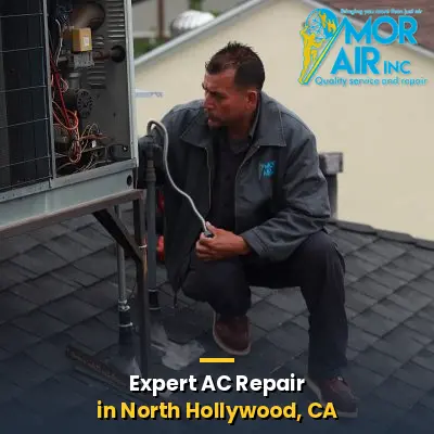 technician repairing air conditioner