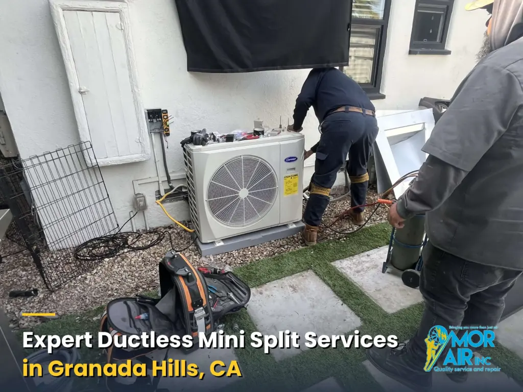 technician working on a ductless mini split system