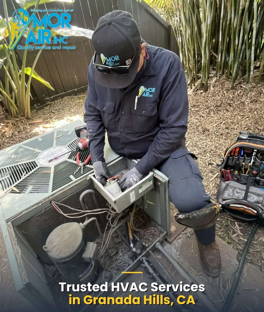 hvac technician servicing an ac