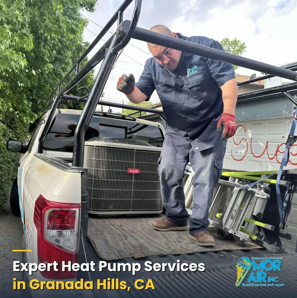 hvac technician installing a heat pump